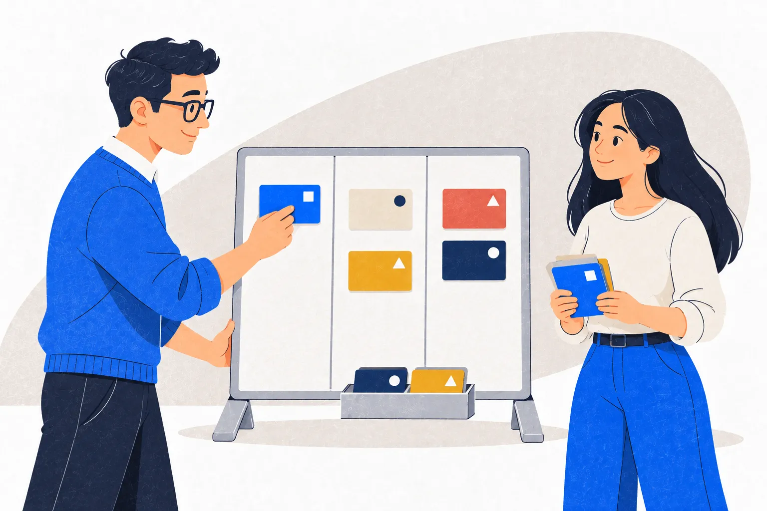 Two colleagues move cards on a simple board